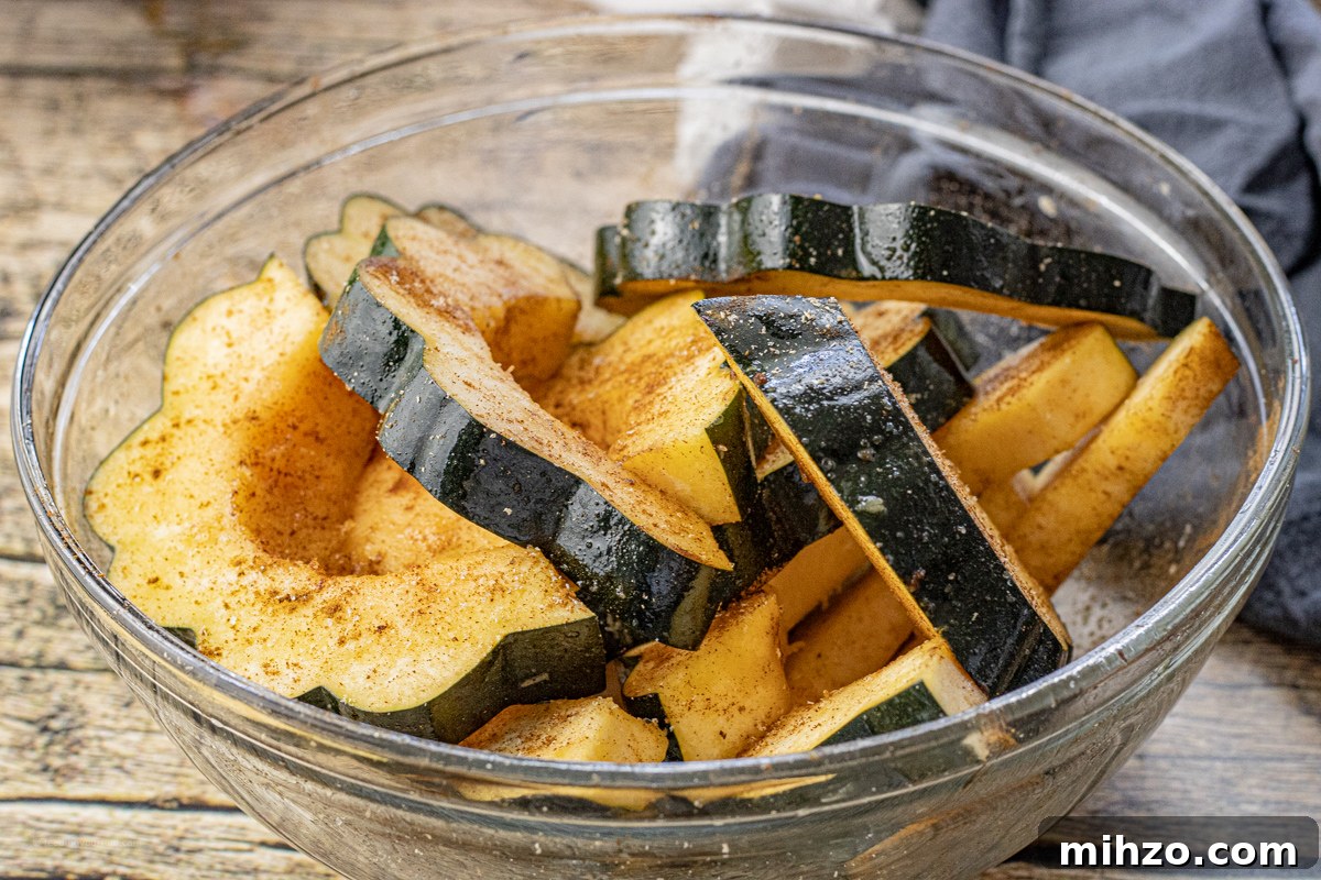 Crispy Roasted Acorn Squash in the Air Fryer 5 slices of acorn squash seasoned with cinnamon and nutmeg