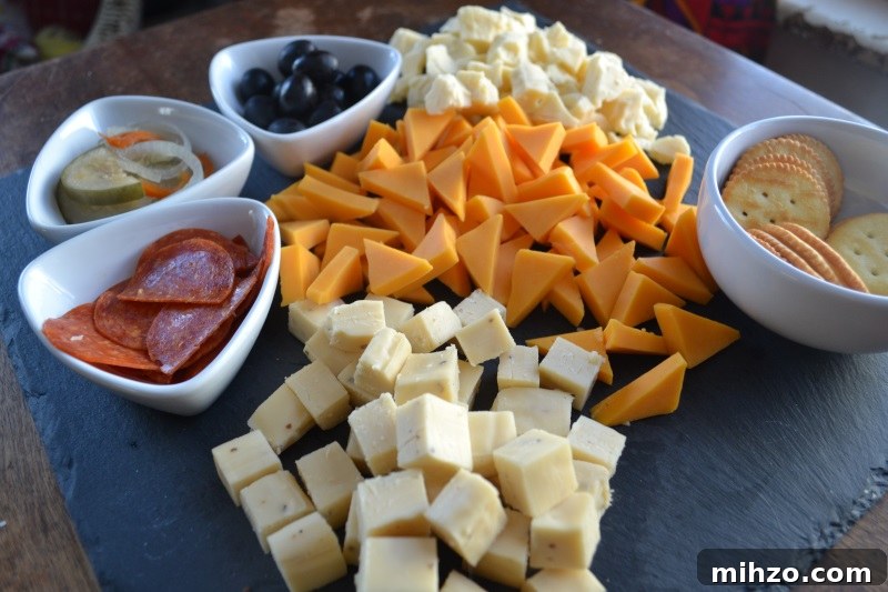 Meat and Cheese Snack Board with three kinds of cheese makes snacking easy.