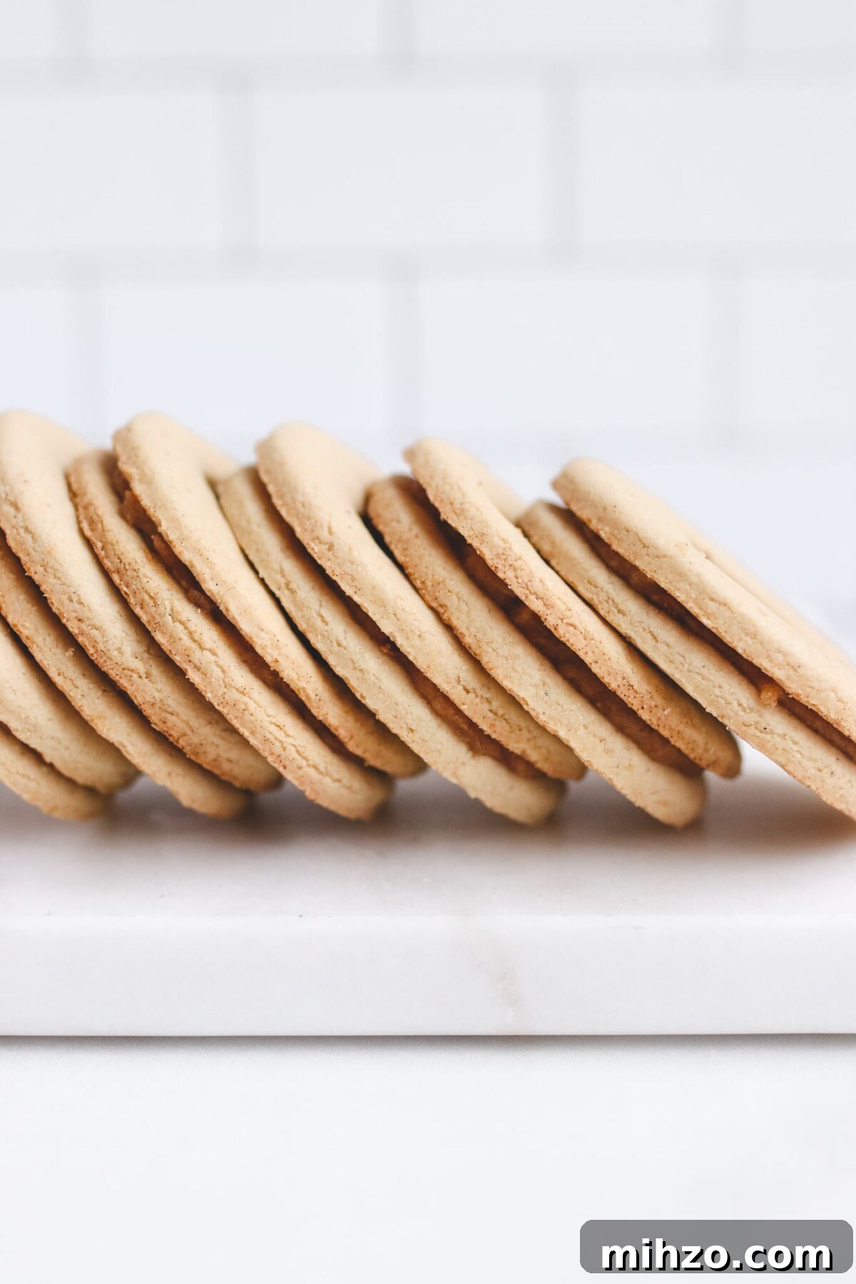 Vegan Gluten-Free Salted Caramel Cookie Recipe 4 shortbread cookies side by side with a white background