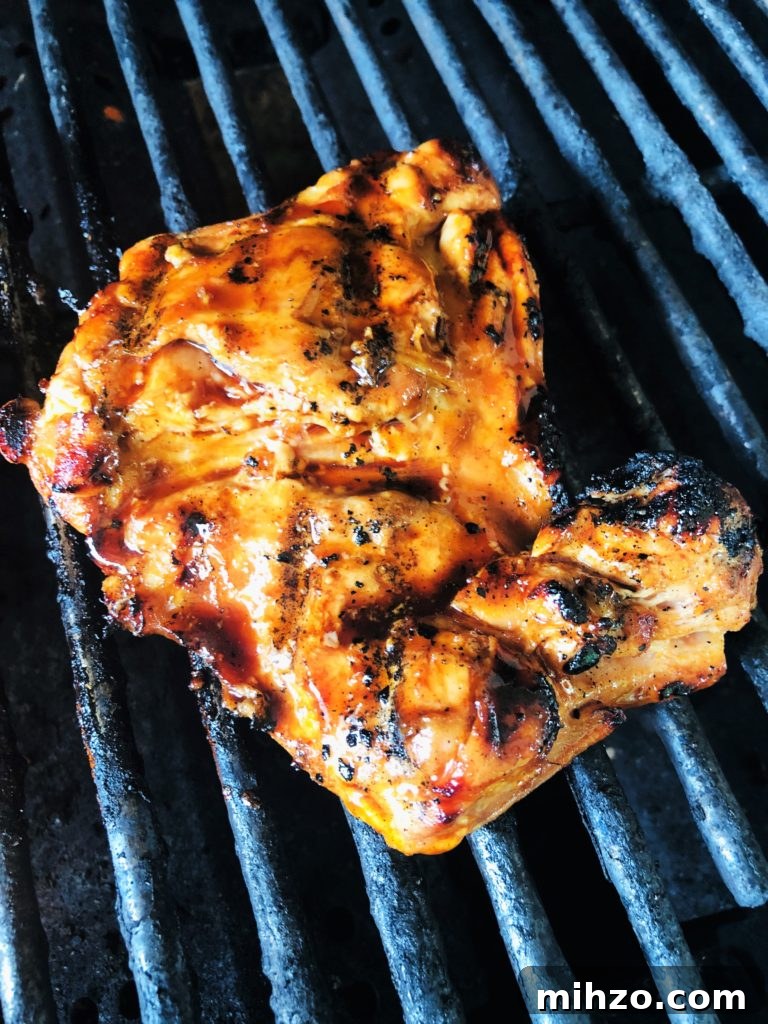 Maple Sriracha Grilled Chicken Recipe for Sweet-Spicy Flavor 4 chicken on the grill