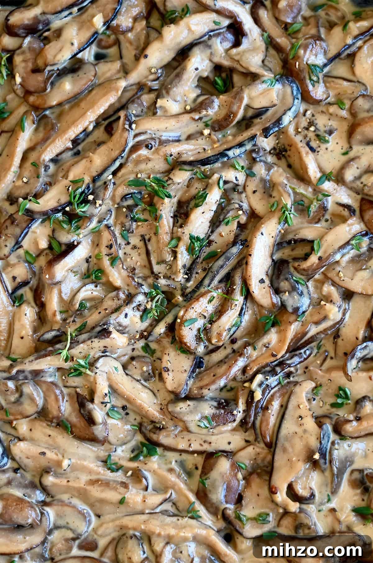 Creamy Garlic Mushroom Sauce for Pasta and Steak 4 Sliced cremini and shiitake mushrooms in a creamy sauce made with heavy cream and beef stock, and garnished with fresh thyme.