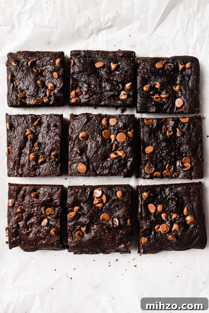 Fudgy Pumpkin Brownies with Warm Spice Flavor 8 Healthy pumpkin brownies cut into nine squares.