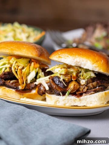 Zesty Lemon Blondies with Luscious Glaze 22 Two braised beef sliders topped with citrus slaw.