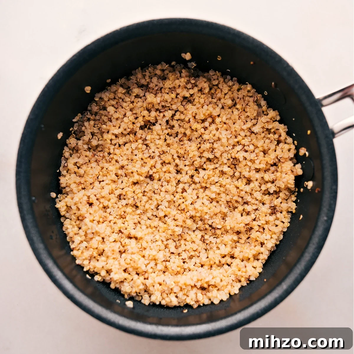 Quinoa cooked in a pot for these Buddha bowls.