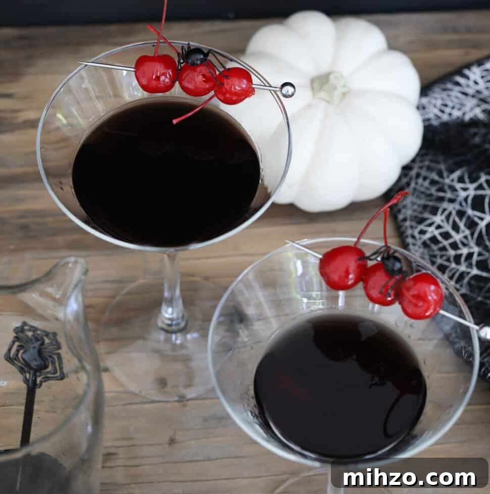 Black Widow Halloween Martini Recipe: Spooky Spider Cocktail 12 Two Halloween black drinks with maraschino cherry garnish