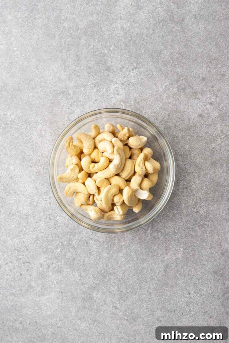A bowl with raw unsalted cashews.
