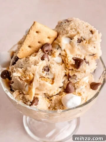 Scoops of edible s'mores cookie dough in a bowl.