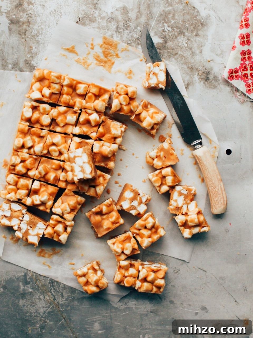 Butterscotch Peanut Butter Confetti Squares — Fun Party Treats 2 peanut butter marshmallow bars cut into squares on a sheet