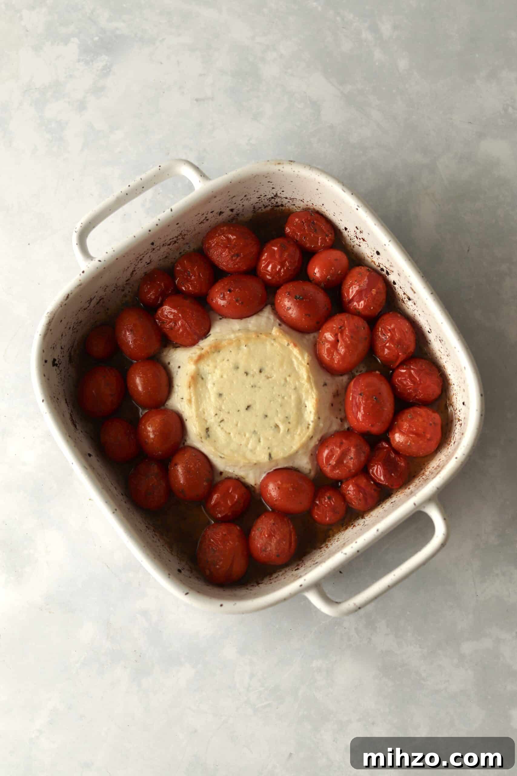 baked Boursin and tomatoes in baking dish