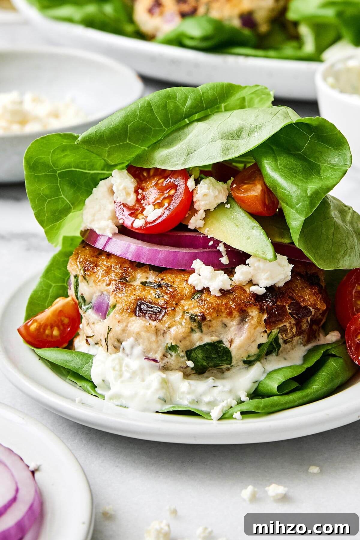 Greek chicken burger lettuce wrap.