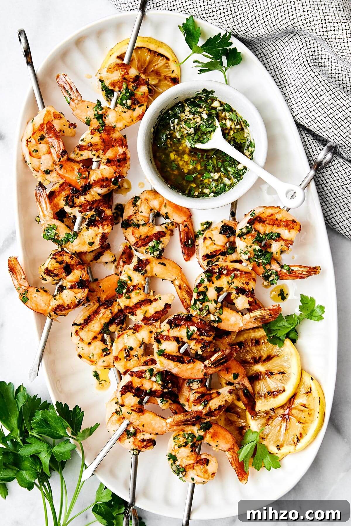 A plate of grilled shrimp skewers.