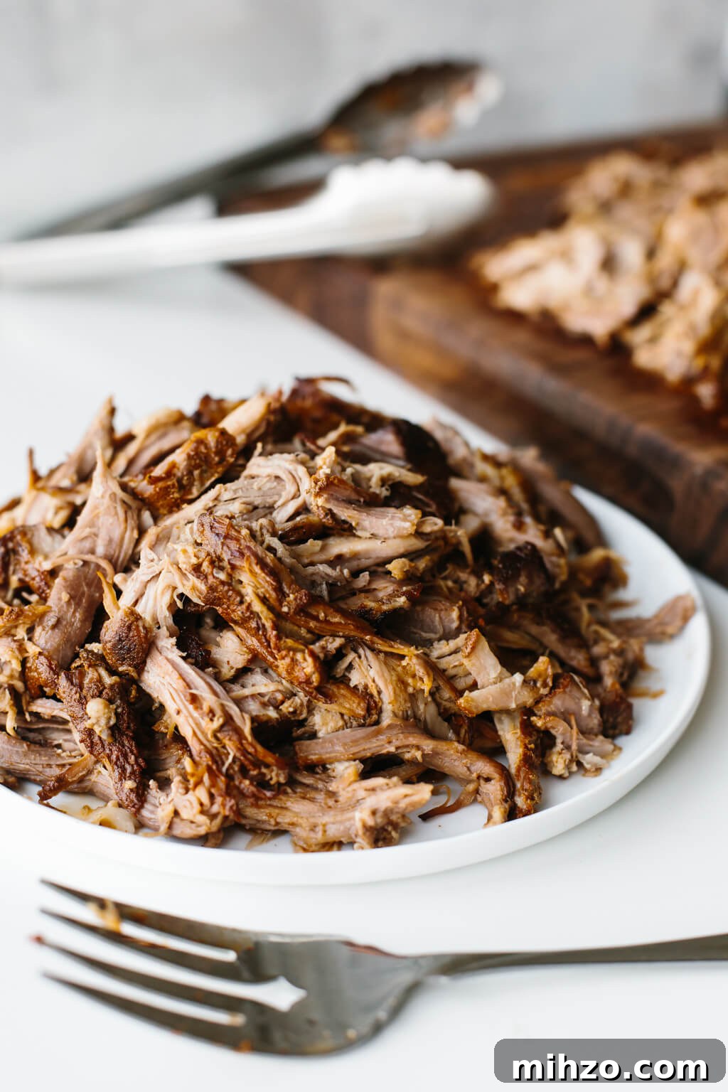 Slow cooker pulled pork is juicy, flavorful and delicious. The best slow cooker recipe!
