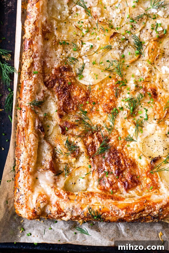 Crispy Potato and Cheese Puff Pastry Tart Recipe 5 Baked potato tart slice