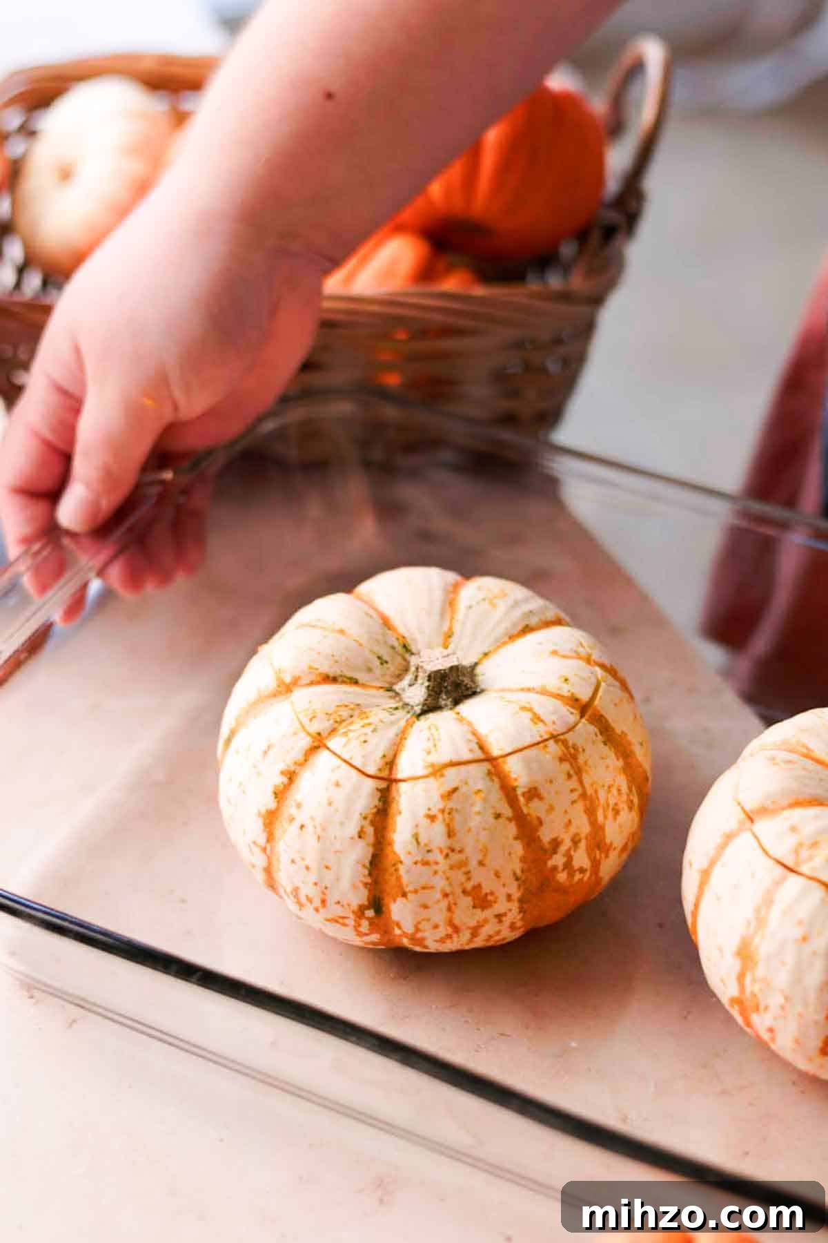 Pumpkin Crème Brûlée Recipe — Silky Fall Dessert Tutorial 4 mini pumpkins with tops cut off on glass baking dish