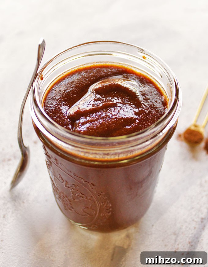This gluten free red enchilada sauce is so easy to make - it only takes a few minutes and makes use of pantry staple ingredients. It's the perfect sauce for any enchilada recipe. Great for Cinco de Mayo or when you have a craving for good Mexican food! (Vegetarian/Vegan) | robustrecipes.com