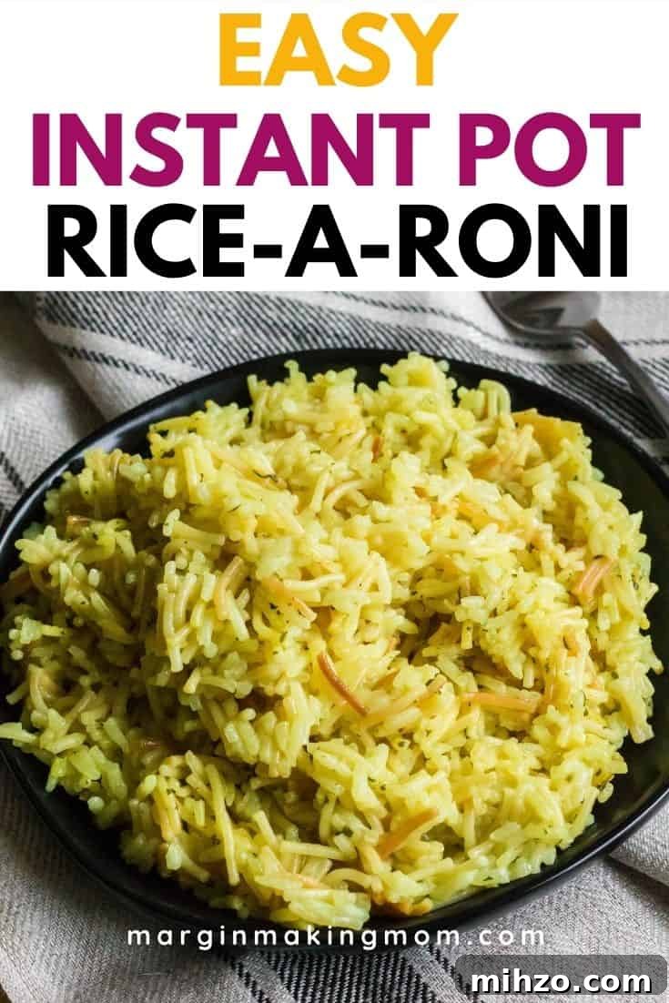 Instant Pot Rice-A-Roni: Quick One-Pot Copycat Recipe 2 a black plate with Instant Pot Rice-a-Roni heaped on it