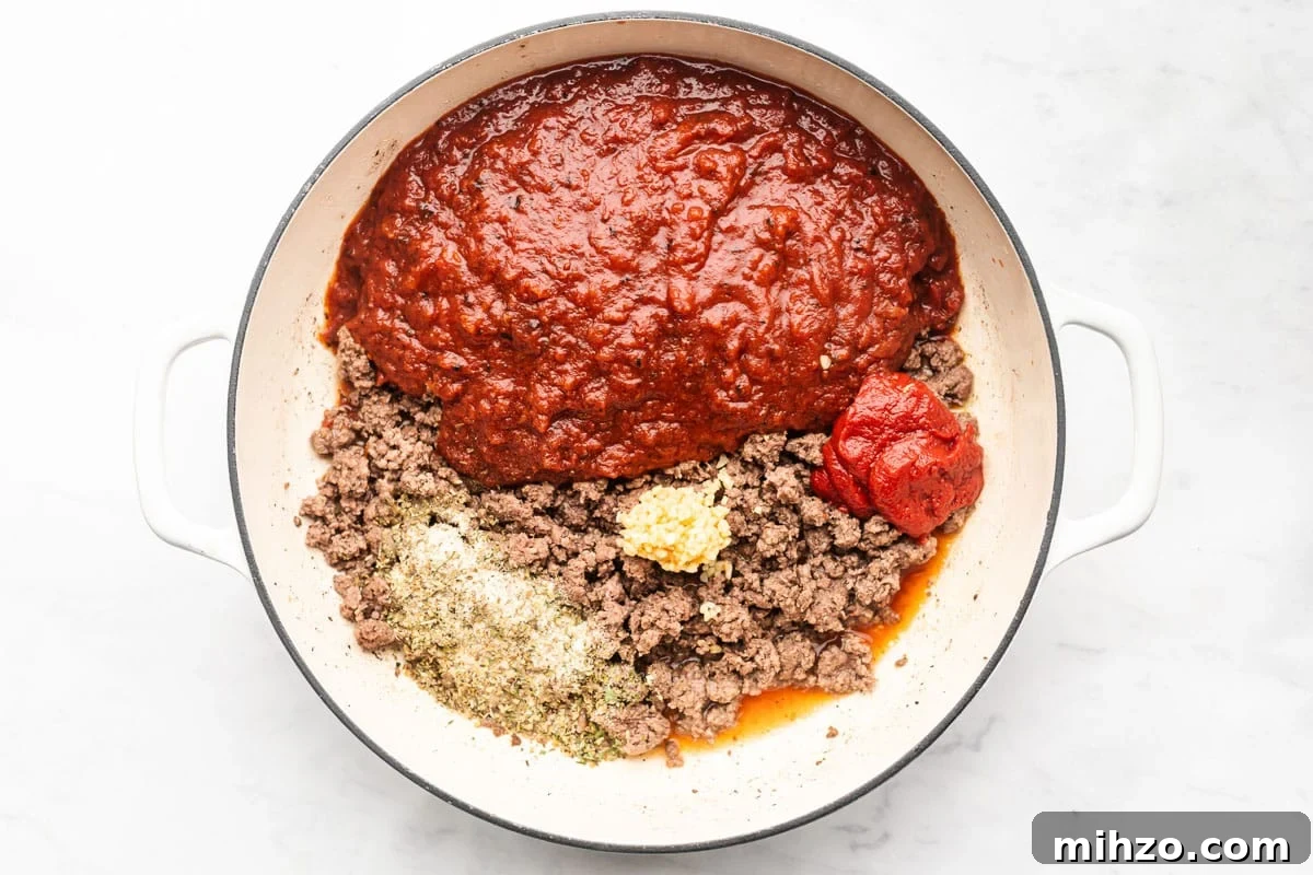 Classic Homemade Spaghetti Sauce Recipe 4 Simmering pot of spaghetti sauce