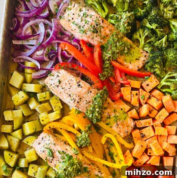 sheet pan salmon and veggies with chimichurri sauce.