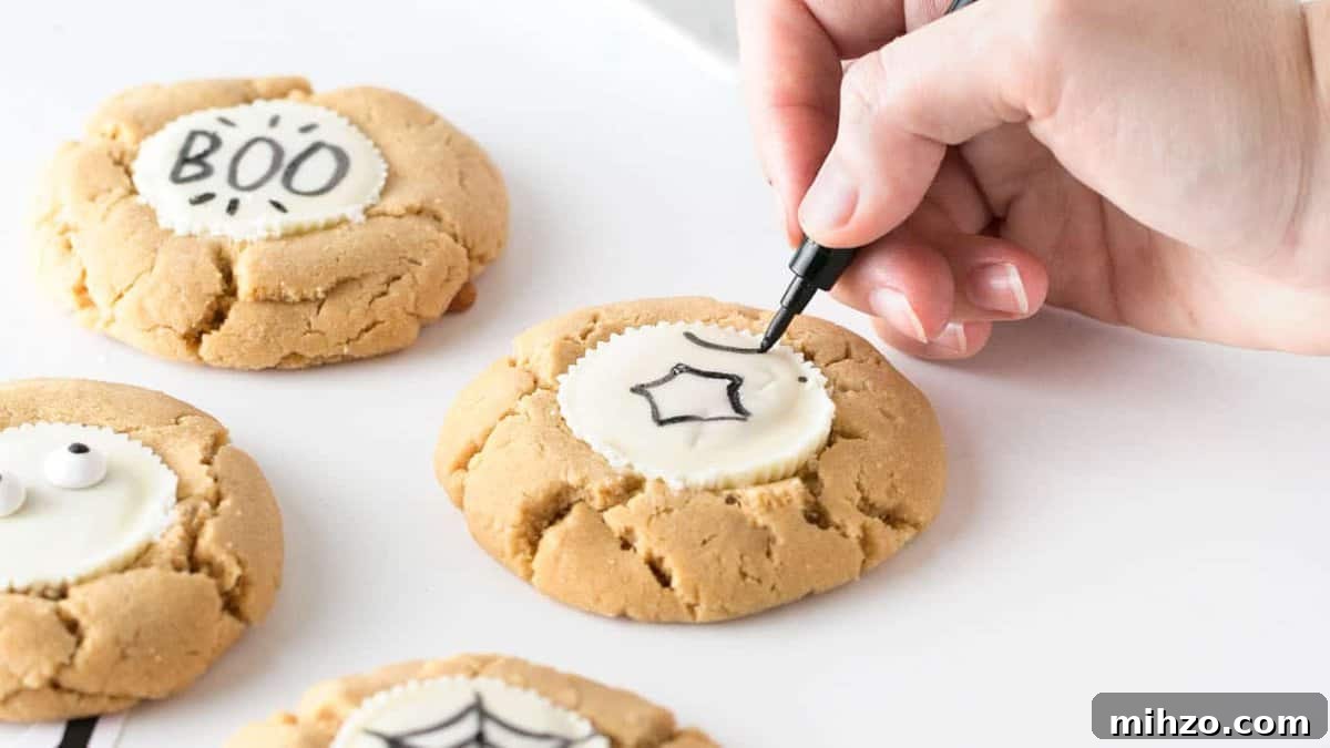 DIY Halloween Cookies: Draw Your Own Spooky Designs 10 Close-up of cookies on a plate