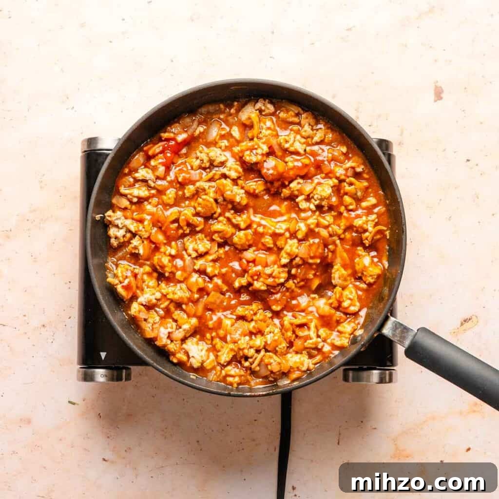 Ground Chicken Sloppy Joes with Tangy BBQ Sauce 5 sloppy Joe mixture in pan before simmering.