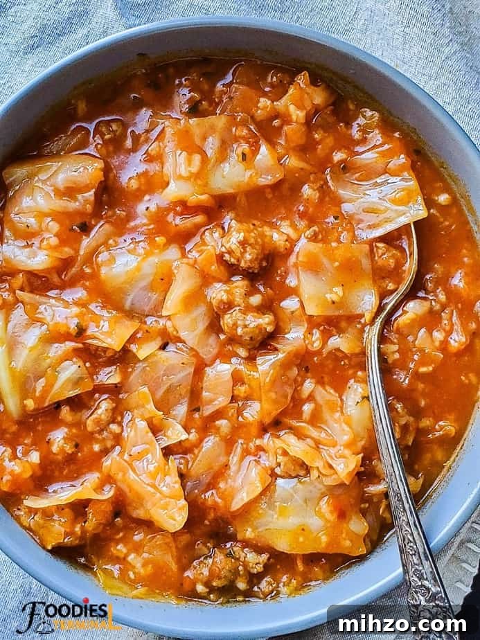 Instant Pot Unstuffed Cabbage Roll Soup Recipe 2 unstuffed cabbage roll soup instant pot in a grey bowl with spoon