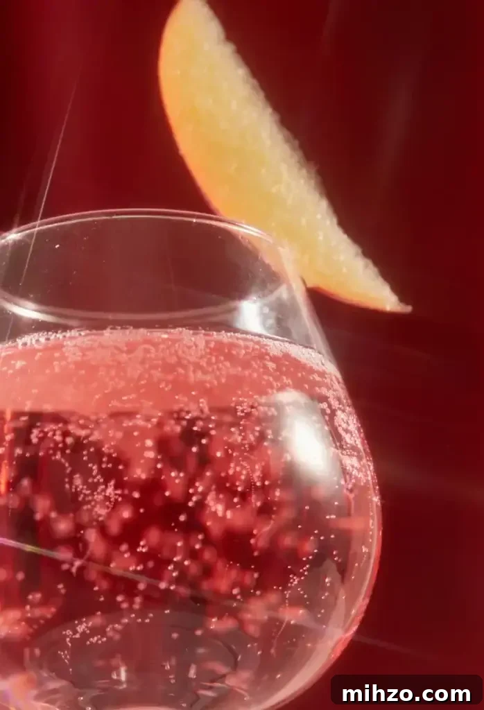 How to Make a Pink Whitney Cocktail at Home 4 Pink Whitney cocktail poured