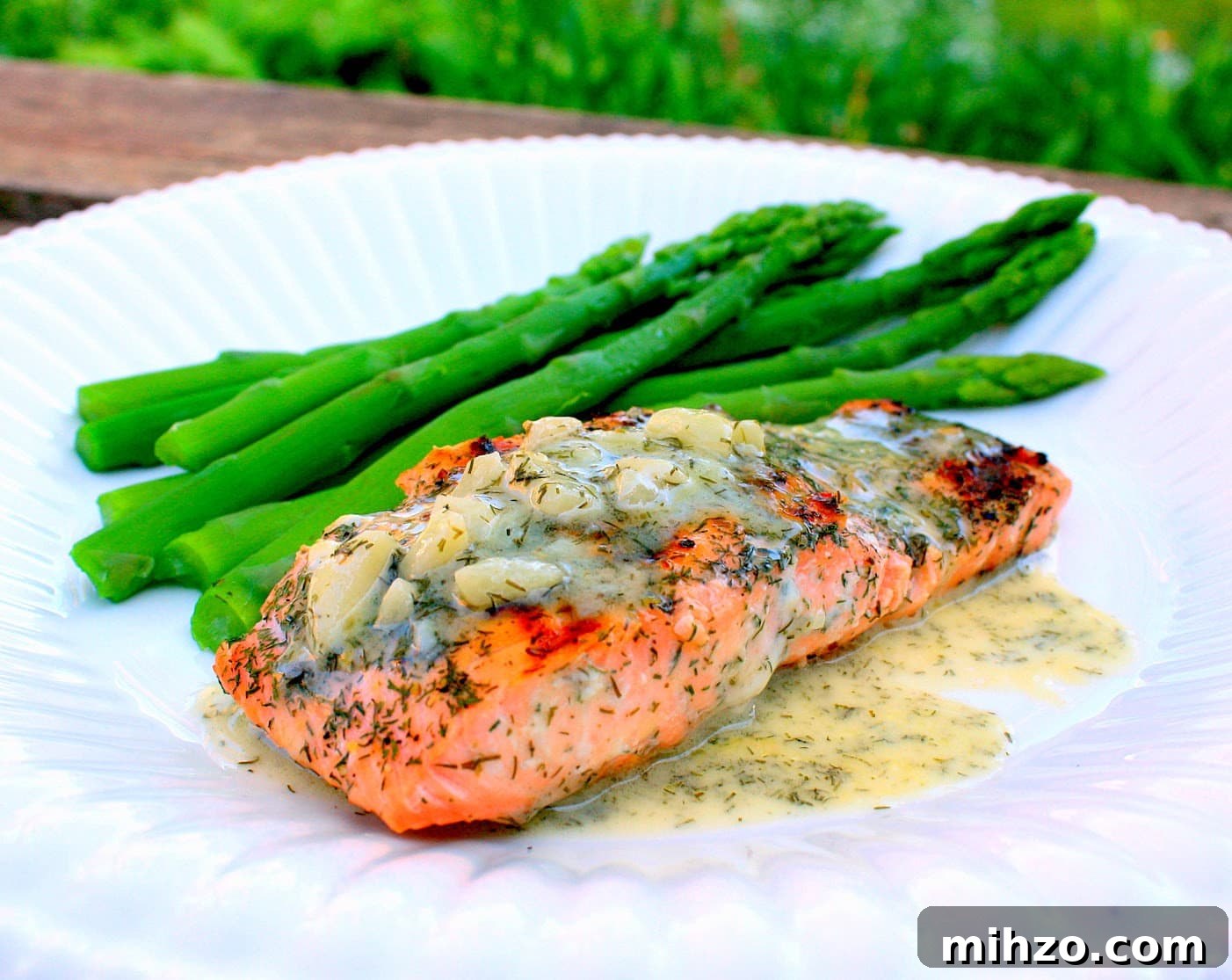 20 Sweet and Savory Father's Day Treats for Dad 8 Salmon with Tangy Dill Butter Sauce