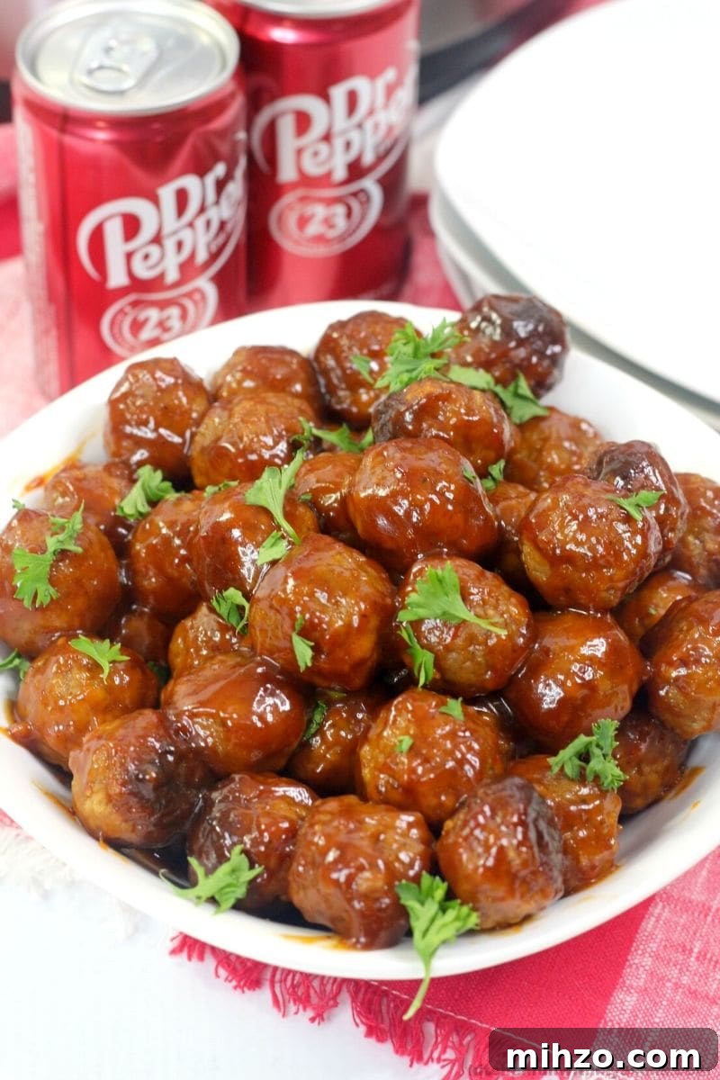 Dr Pepper-Glazed Meatballs with Sweet BBQ Sauce 4 Dr Pepper Instant Pot Meatballs in a white bowl