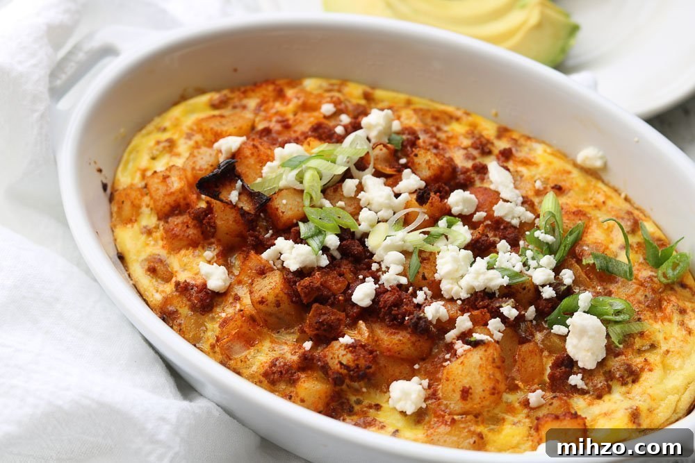 Baked Mexican Chorizo and Eggs Casserole 3 Baked Mexican Chorizo and Eggs with avocado in the background
