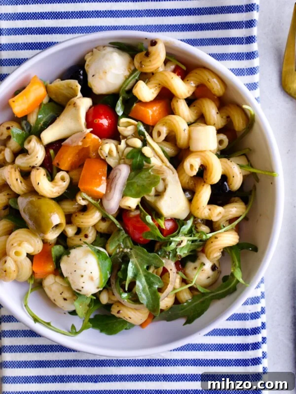 Italian Potato and Green Bean Salad Recipe 11 Antipasto Pasta Salad Recipe (with Italian Dressing) in a bowl with a fork