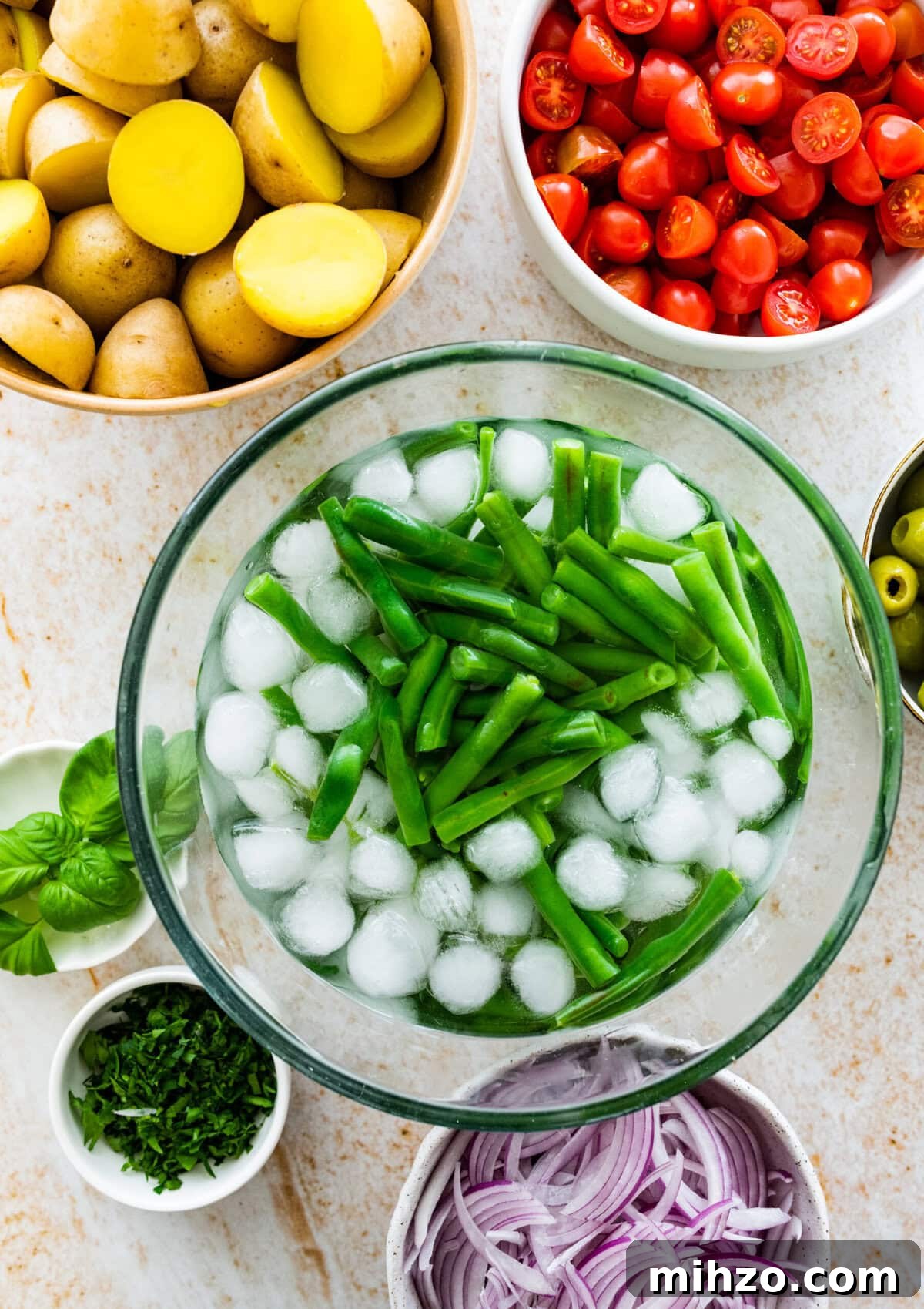 Italian Potato and Green Bean Salad Recipe 6 How to make Italian potato salad: green beans in ice water after boiling.