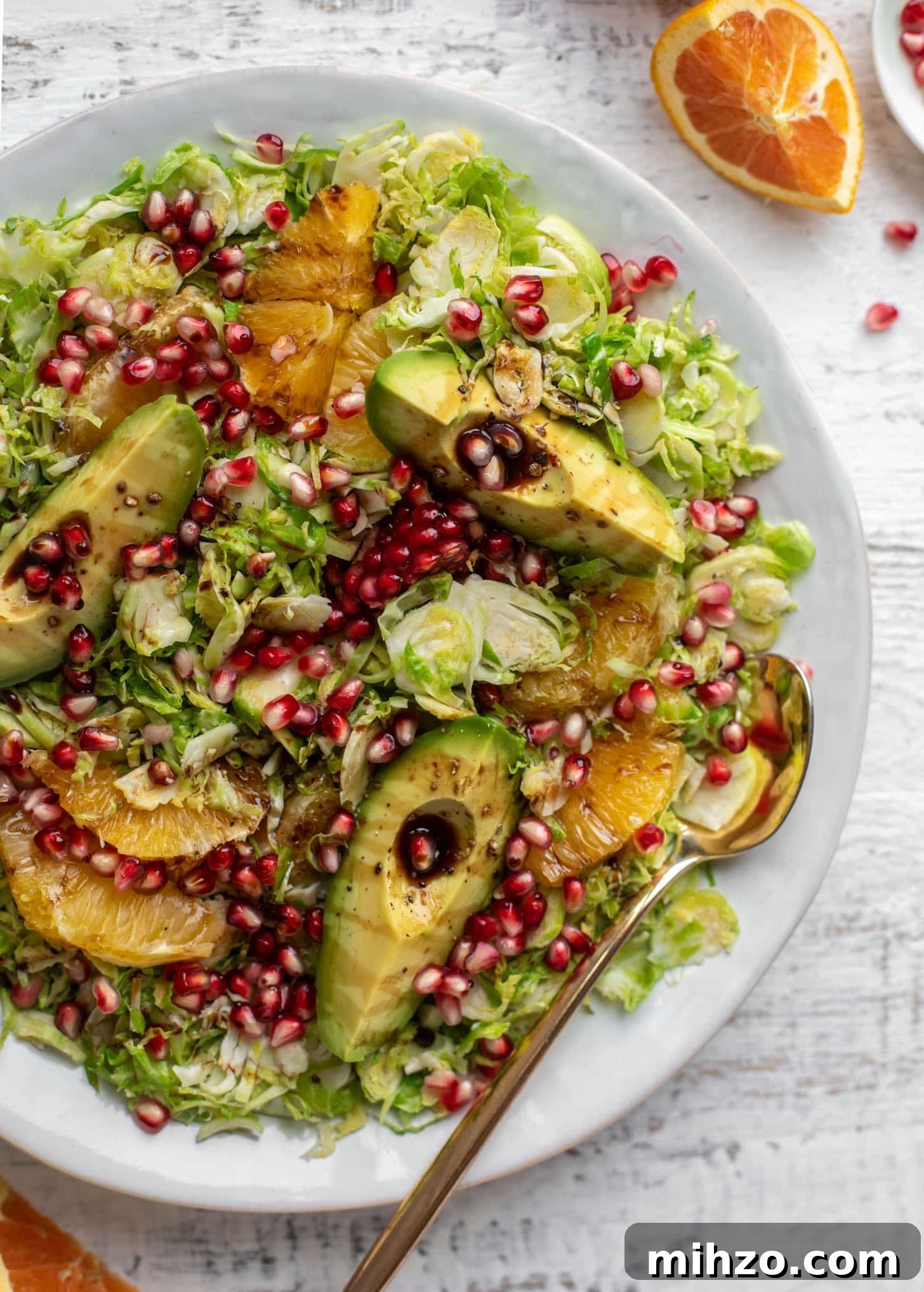 Citrus Brussels Sprouts Salad with Avocado & Pomegranate 2 shredded citrus brussels sprouts salad with avocado and pomegranate