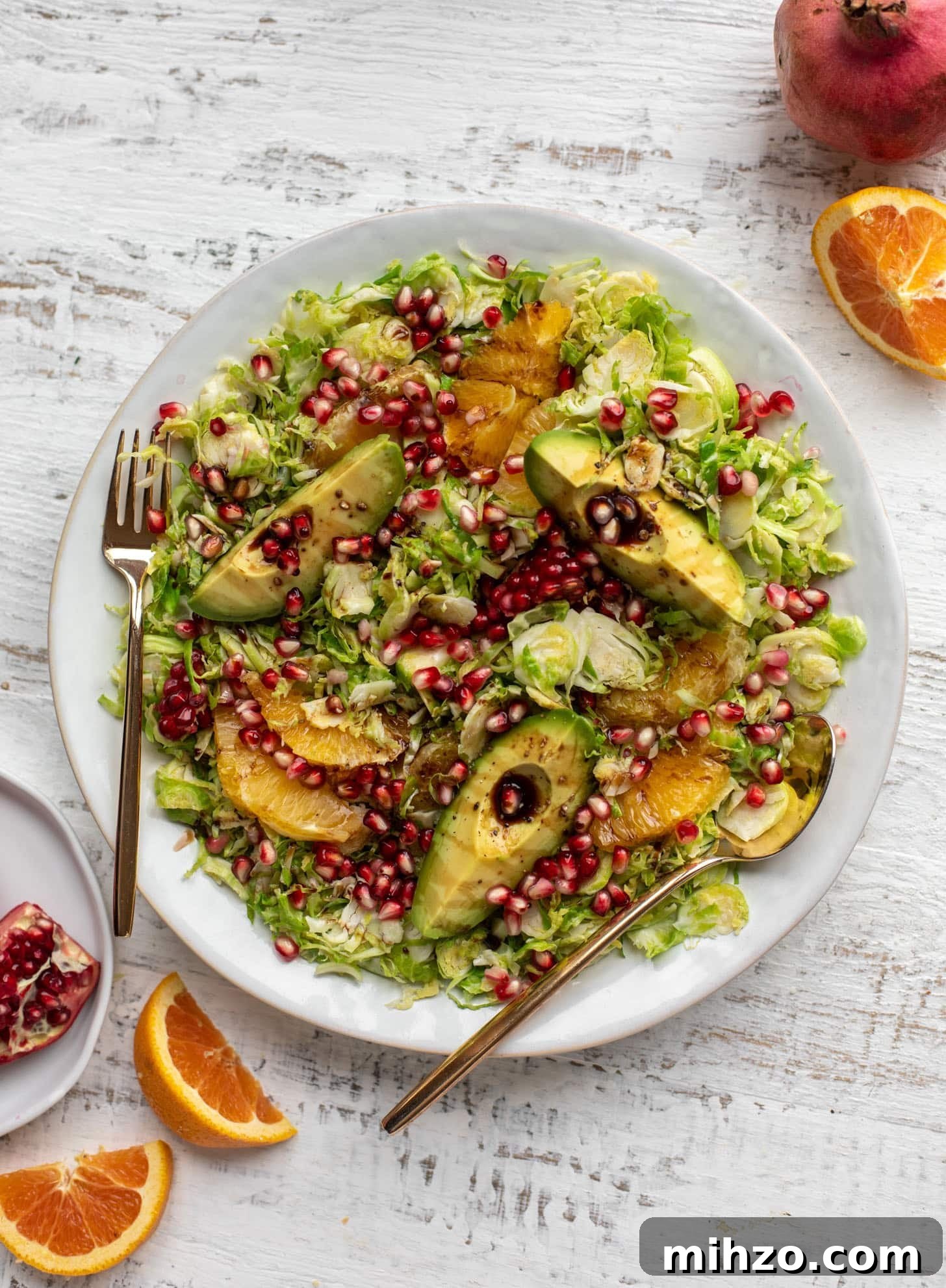Citrus Brussels Sprouts Salad with Avocado & Pomegranate 7 shredded citrus brussels sprouts salad with avocado and pomegranate
