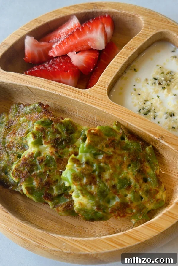 Green bean fritters served with strawberries and yogurt dip.
